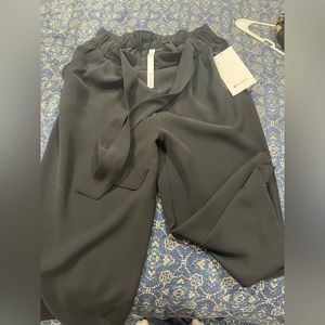 Black, Size 10 NWT Lululemon Noir Crop pants. Never worn! Perfect condition